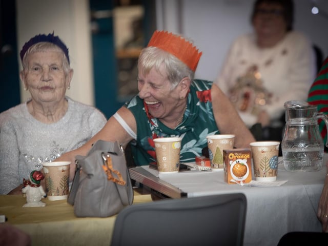 BINGO!. . . .Senior citizens having bingo fun during last week's event in the Cathedral Youth Club.