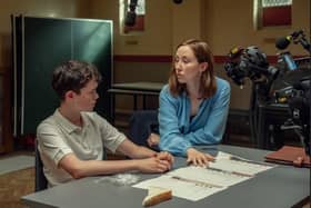 Adolescence. (L to R) Owen Cooper as Jamie Miller, Erin Doherty as Briony Ariston, on the set of Adolescence. Cr. Courtesy of Ben Blackall/Netflix © 2024