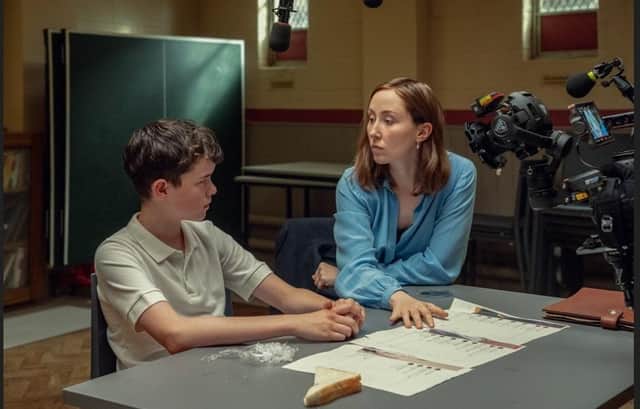 Adolescence. (L to R) Owen Cooper as Jamie Miller, Erin Doherty as Briony Ariston, on the set of Adolescence. Cr. Courtesy of Ben Blackall/Netflix © 2024