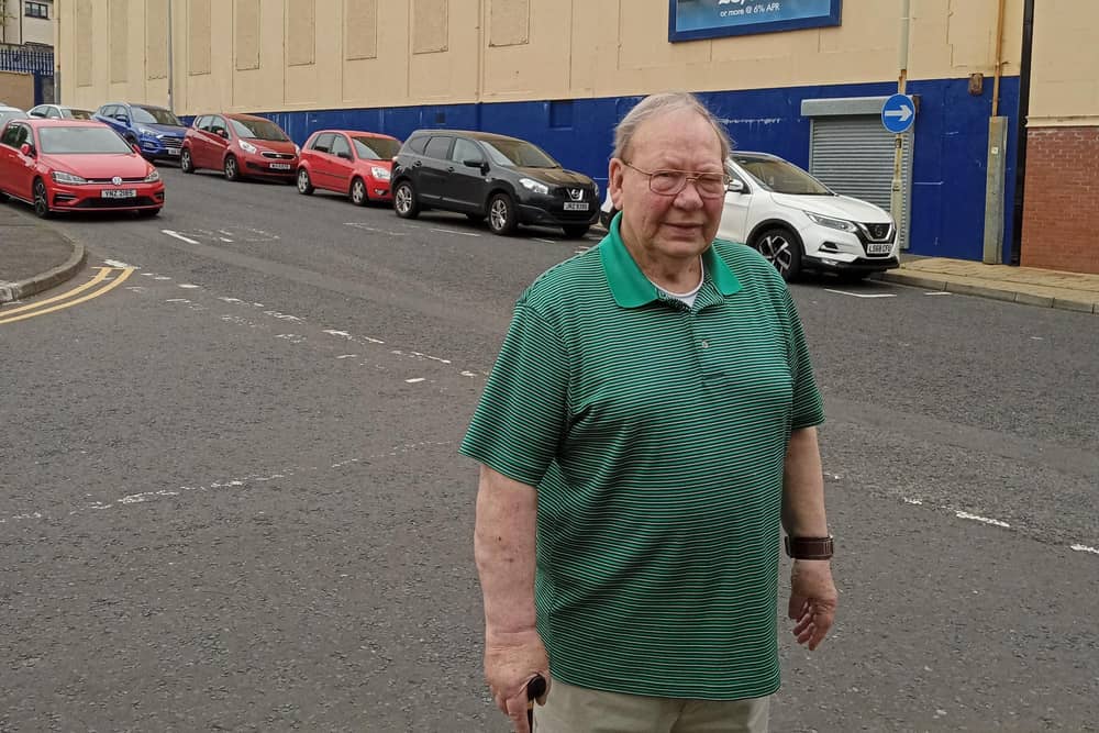 The late Raymond Rogan, pictured here in 2021 outside the Stardust, which he managed for many years.