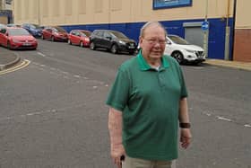 The late Raymond Rogan, pictured here in 2021 outside the Stardust, which he managed for many years.