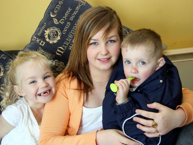 Megan pictured with her aunt Shauna and cousin Lee at her birthday party.0016JML : Parties in Derry in Spring 2006.
