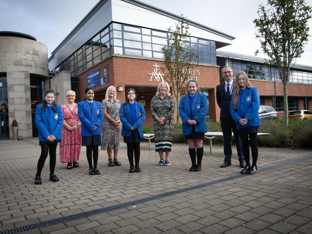 Mr. Brendan McGinn, Principal, St. Mary's College and members of staff pictured on Friday morning with some of the new Year 8s who attended the school on their first day. (Photos: JIm McCafferty Photography)