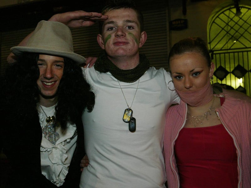 Jonathan David, Malachy Fisher and Emma Logue from Rosemount.  (0311JB46) :20 YEARS ON: Halloween celebrations in Derry in 2003