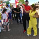 Turlough O'Neill and Margaret Cunningham dance during the Annual Farland Way Hazelbank Big Lunch. Photo: George Sweeney