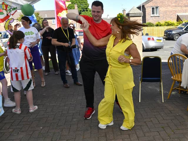Turlough O'Neill and Margaret Cunningham dance during the Annual Farland Way Hazelbank Big Lunch. Photo: George Sweeney