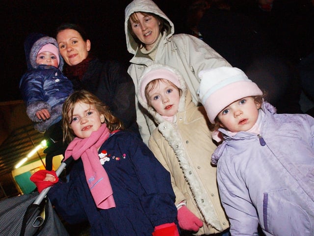 Braving the cold winter weather in Moville are, front from left, Nicole Cavanagh, and Michaela and Rosemary McDermott. Back row, from left, Kelli and Geraldine Cavanagh, and Rose McDermott. (0612PG58) : Christmas in Inishowen in 2005.