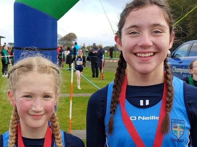 Hollybush PS pupils Maeve O'Donnell and Marie Devine who took first and second places at the Flahavan's Cross Country Championships held at Thornhill in October last.