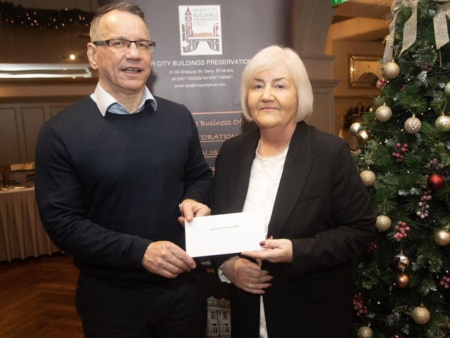 Steven Lindsay, Inner City Trust, pictured handing over a cheque to Jacqui Garnon, North West Volunteer Centre, at the Bishop's Gate Hotel, Derry on Thursday afternoon last. The event was part of the Inner City Trust's Annual Charity Giving. (Photos: Jim McCafferty Photography)