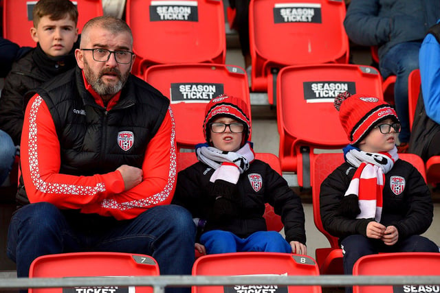 Derry City fan Eoin Kivelehan and family patiently await kick-off against Finn Harps. Photo: George Sweeney. DER2305GS – 20