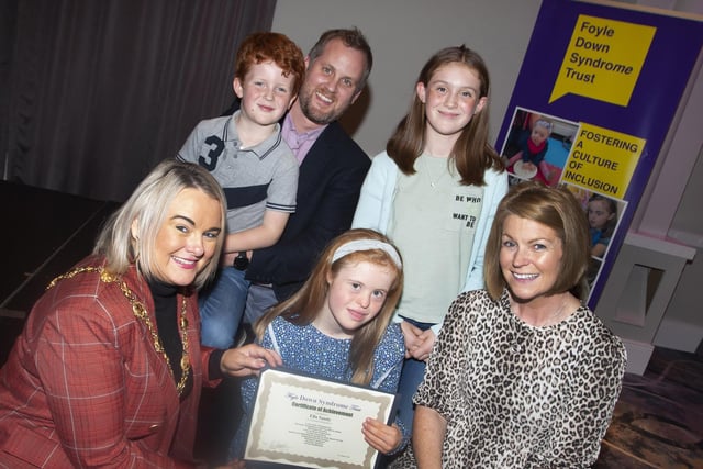 Mayor Sandra Duffy presenting Ella Sandy and family with her certificate and gift on Tuesday night.