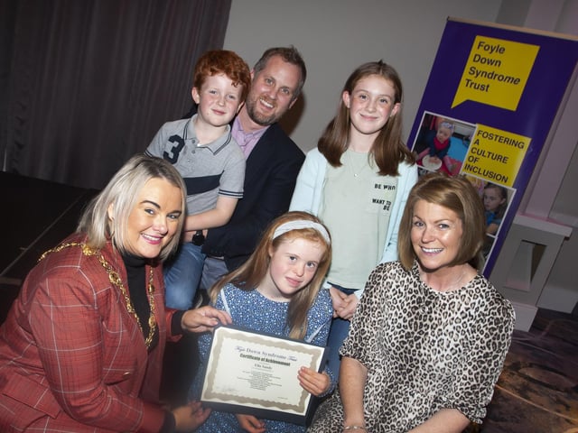 Mayor Sandra Duffy presenting Ella Sandy and family with her certificate and gift on Tuesday night.