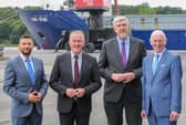 Infrastructure Minister John O'Dowd and Economy Minister Conor Murphy are pictured at Foyle Port with the Port's Chair Ryan McCready and Chief Executive Brian McGrath. Photo: Lorcan Doherty.