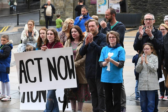 Some of the attendance, in Guildhall Square, at Caleb's Cause rally calling for legal protection for young people with Special Educational Needs who have disabilities in Northern Ireland beyond the age of 19. Photo: George Sweeney