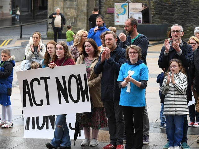 Some of the attendance, in Guildhall Square, at Caleb's Cause rally calling for legal protection for young people with Special Educational Needs who have disabilities in Northern Ireland beyond the age of 19. Photo: George Sweeney