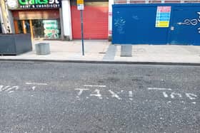 Worn loading bay and taxi rank markings on the Strand Road on November 11.