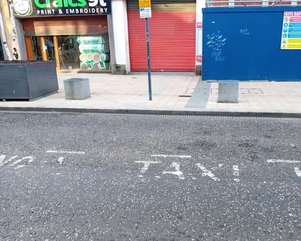 Worn loading bay and taxi rank markings on the Strand Road on November 11.
