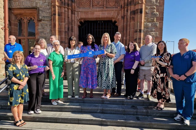 The Mayor of Derry and Strabane Lilian Seenoi-Barr with representatives of the Western Trust, Age Concern Causeway, the Public Health Agency, Derry GP Federation, DEEDS and service users at the launch of the Age Concern Causeway Dementia Wristband initiative at the Guildhall.