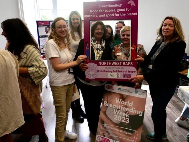 Mayor Patricia Logue with staff from WHSCT and members of North West BAPS