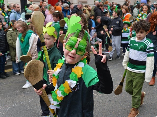 The Derry St Patrick’s Day parade makes its way towards the city centre on Monday afternoon. Photo: George Sweeney.