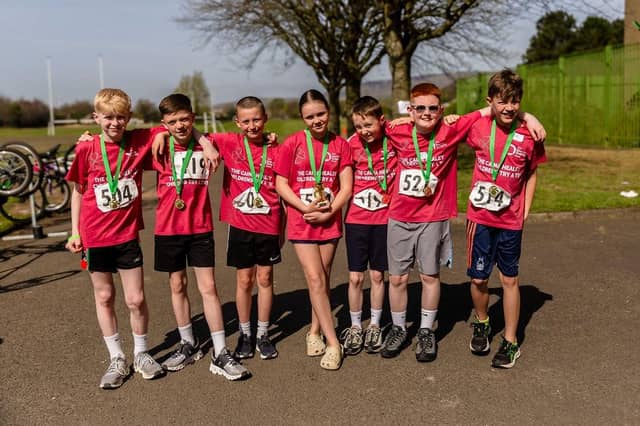 Some of the children from 14 local primary schools who took part in the biggest-ever Caina Healey Children's Try-a-Tri, organised by the Bogside and Brandywell Health Forum in partnership with the Danny Quigley Fund. (Photos: Michelle Campbell)