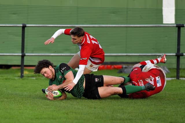 Killene Thornton goes over to score City of Derry’s first try against Randlestown. Photo: George Sweeney