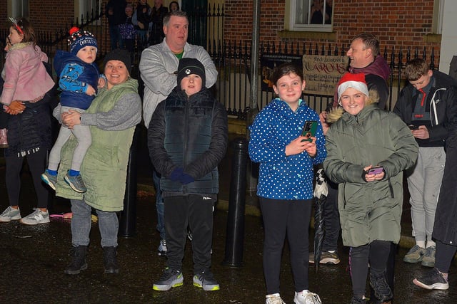 Families pictured at the Derry Christmas procession on Sunday evening last. Photo: George Sweeney. DER2248GS - 22 