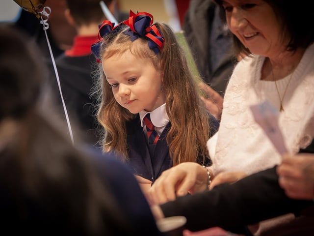 One young lady captured enjoying spending time with granny during 'Grandparents To School' Day at Holy Child PS. (Photos: Jim McCafferty Photography) : .
