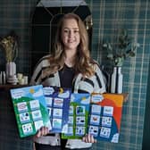 Kerri Thompson with her visual communication supports, Helpful Little Pictures