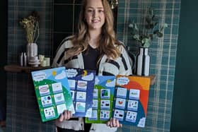 Kerri Thompson with her visual communication supports, Helpful Little Pictures