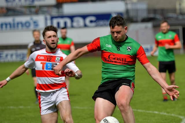 Doire Trasna’s Sean Fleming scores a first half point against Ballerin in the Neil Carlin Cup Final, at Celtic Park, on Sunday afternoon. Photo: George Sweeney. DER23119GS – 02