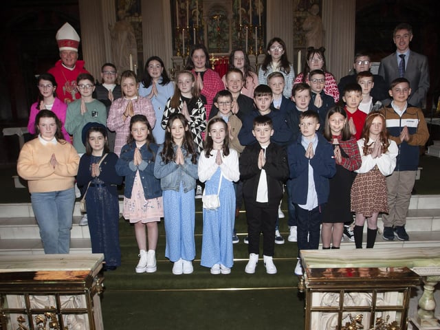 Pupils from Long Tower PS who received the Sacrament of Confirmation from Rev. Dr. Donal McKeown at St. Columba’s Church, Long Tower on Thursday evening last. Included is Mr. Ian Gallagher, Vice Principal. (Photos: Jim McCafferty Photography)