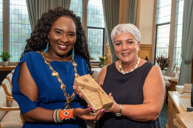 The Mayor Councillor Lilian Seenoi-Barr pictured with Karen Boyd, St Thérèse's Primary School during a reception with her family and friends to mark her retirement from teaching. Picture Martin McKeown. 28.08.24