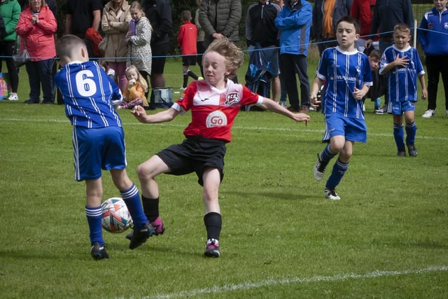 Action from the Milford v. Maiden City u-9 match during the O’Neills Foyle Cup on Monday at Templemore Sports Complex. (Photos: Jim McCafferty Photoghraphy)