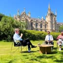 Mark Carruthers hosting his Red Lines podcast on the lawn at Ulster University's Magee College with local councillors Ryan McCready, Lilian Seenoi-Barr and Shaun Harkin.