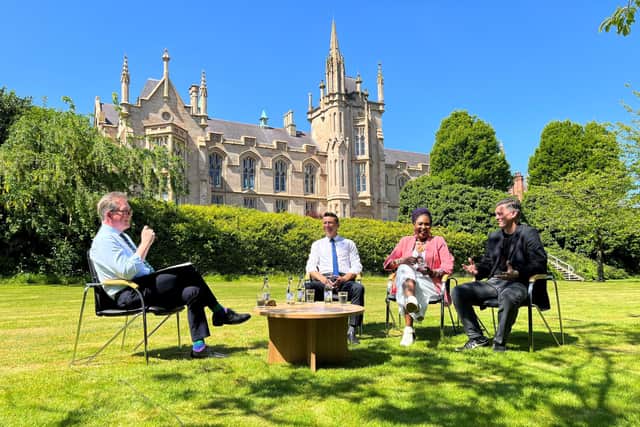 Mark Carruthers hosting his Red Lines podcast on the lawn at Ulster University's Magee College with local councillors Ryan McCready, Lilian Seenoi-Barr and Shaun Harkin.