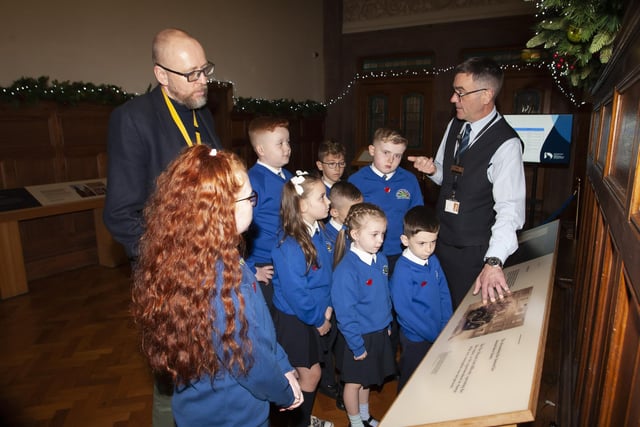 Pupils from St. Paul’s PS School Council, Slievemore, Derry, pictured with their Principal, Mr. Gareth Blackery, getting a tour of the Guildhall on Monday morning last. 
