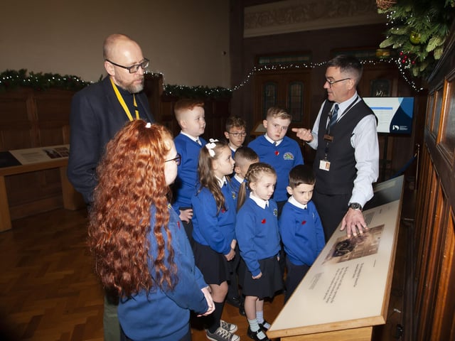 Pupils from St. Paul’s PS School Council, Slievemore, Derry, pictured with their Principal, Mr. Gareth Blackery, getting a tour of the Guildhall on Monday morning last. 