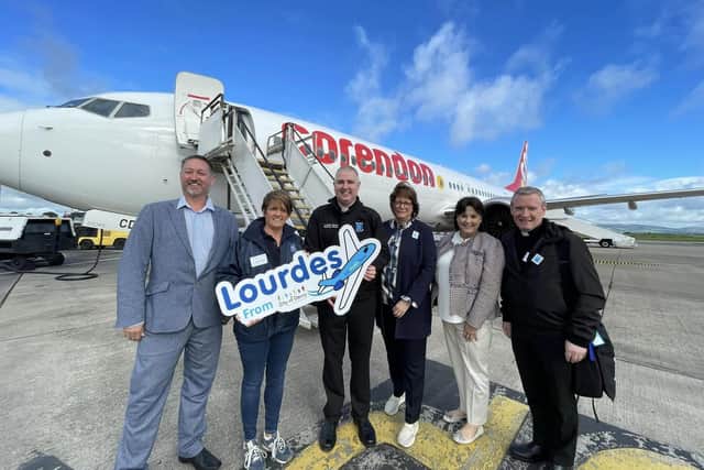 Representatives from City of Derry Airport and Joe Walsh Tours with some of the first pilgrims departing this year.
