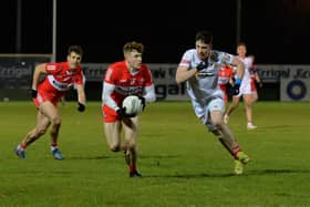 Derry’s Lachlan Murray evades a challenge from Nathan McCarron of Tyrone during the Dr McKenna Cup game at Owenbeg on Wednesday. Photo: George Sweeney. DER2302GS – 10