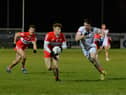 Derry’s Lachlan Murray evades a challenge from Nathan McCarron of Tyrone during the Dr McKenna Cup game at Owenbeg on Wednesday. Photo: George Sweeney. DER2302GS – 10
