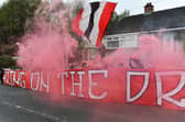Derry City fans at the Brandywell Stadium on Saturday morning prior to the team’s departure for Dublin ahead of Sunday’s FAI Cup Final against Drogheda United. Photograph: George Sweeney