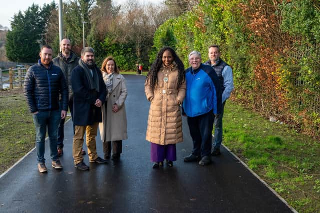 The Mayor Councillor Lilian Seenoi-Barr has officially  opened the Stradowen Greenway Project in Strathfoyle.  The 375 metre stretch of three metre wide greenway connects the Strathfoyle Greenway to Maydown Greenway via Stradowen Drive in Strathfoyle Village. Pictured at the event are Ian Breslin from contractor Adman, Mark H. Durkan MLA, Chris Moore,  UK Shared Prosperity Fund , Ministry Of Housing Communities and Local Government, Karen Phillips, Director of Environment and Regeneration for Derry City and Strabane District Council, Gus Hastings,  Strathfoyle Greenway Community Steering Group  and Colin Kennedy, Natural Environment Regeneration Officer. Picture Martin McKeown. 20.12.24