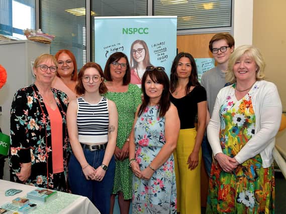 Volunteers pictured at the Childline Foyle open day, held in the Derry office, on Friday morning last. Photo: George Sweeney. DER2321GS - 38