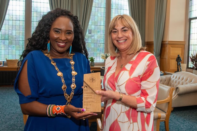 The Mayor Councillor Lilian Seenoi-Barr pictured with Michelle Ramsey who was Principal of the Model Primary School during a reception with her family and friends to mark her retirement from teaching. Picture Martin McKeown. 28.08.24