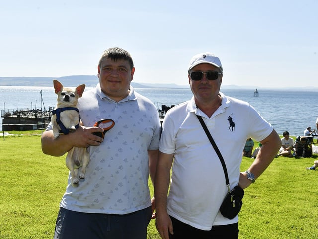Luka with Iaroslav and Segiy at the Moville Summer Festival Pet Show, held on The Green. Photo: George Sweeney
