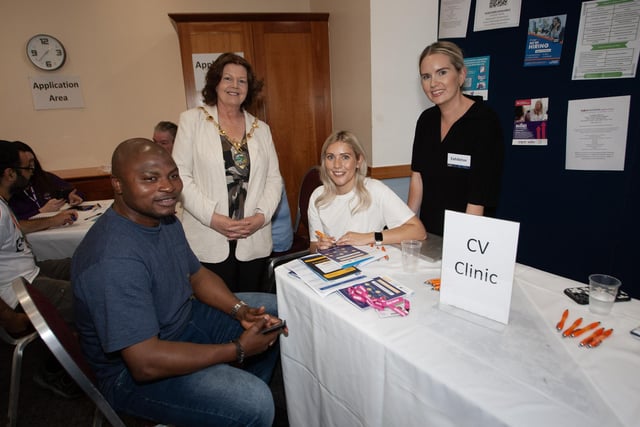 Job hunting lke Chineme Innocent chatting to Careers Service CV Clinic staff Lauren Curry and Erin Doherty, are joined by the Mayor Patricia Logue at the Derry Job Fair in the City Hotel on Tuesday morning. (Photos: Jim McCafferty Photography)