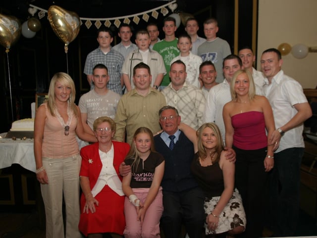 Mr and Mrs McMonagle celebrating 50 years of marriage with their family.