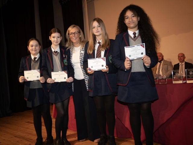 Mrs. Julie-Anne Canning, Head of Year 8 pictured with some of the award winners at the recent Oakgrove Integrated College Junior Prizegiving.
