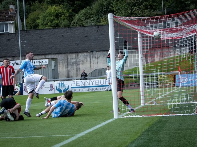 GOAL!. . . .Phoenix' striker Oran Deeney scores to draw level against Tristar in the first half of Saturday's Jimbo Crossan Memorial Cup final at Brandywell. (Photos: Jim McCafferty Photography)